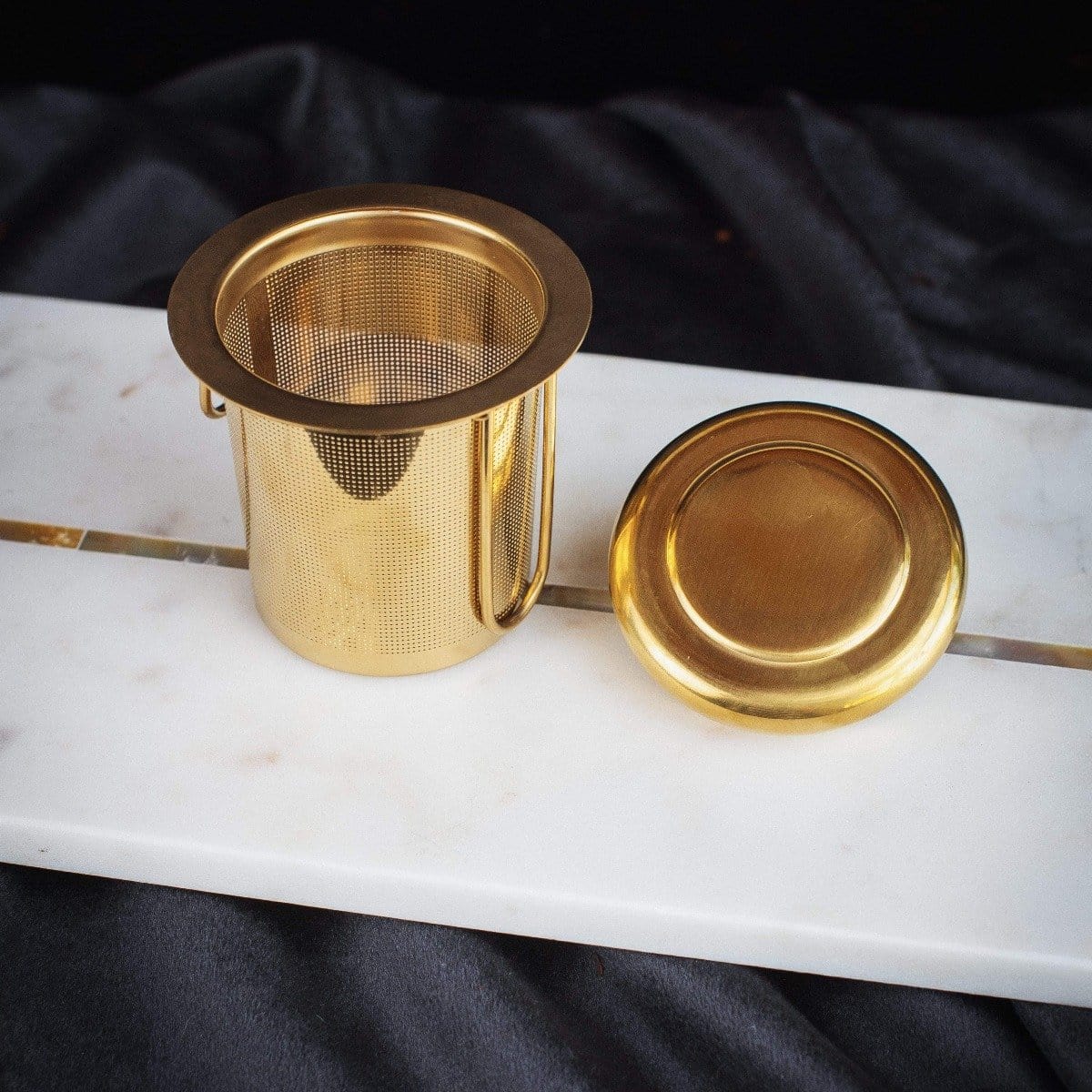 Midas Touch: Golden-Hued Tea Strainer