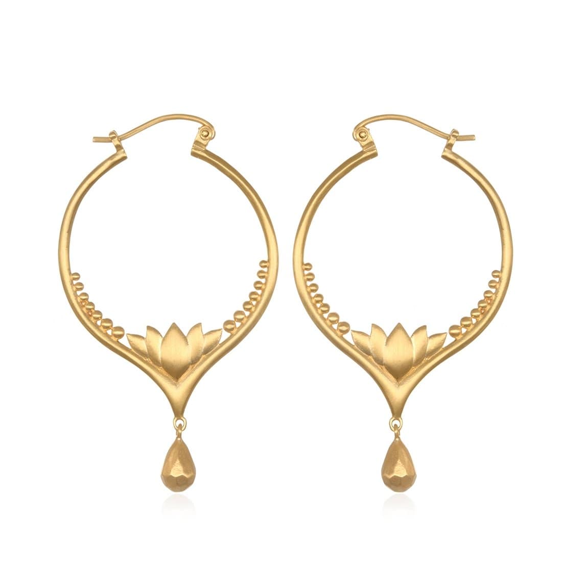 Introducing the Lotus Drop Hoop Gold Earrings- ARCHIVE, a pair of elegant gold-plated hoop earrings with a lotus flower design and a golden teardrop pendant hanging gracefully at the bottom. These earrings feature intricate spiral accents along the inner curve.