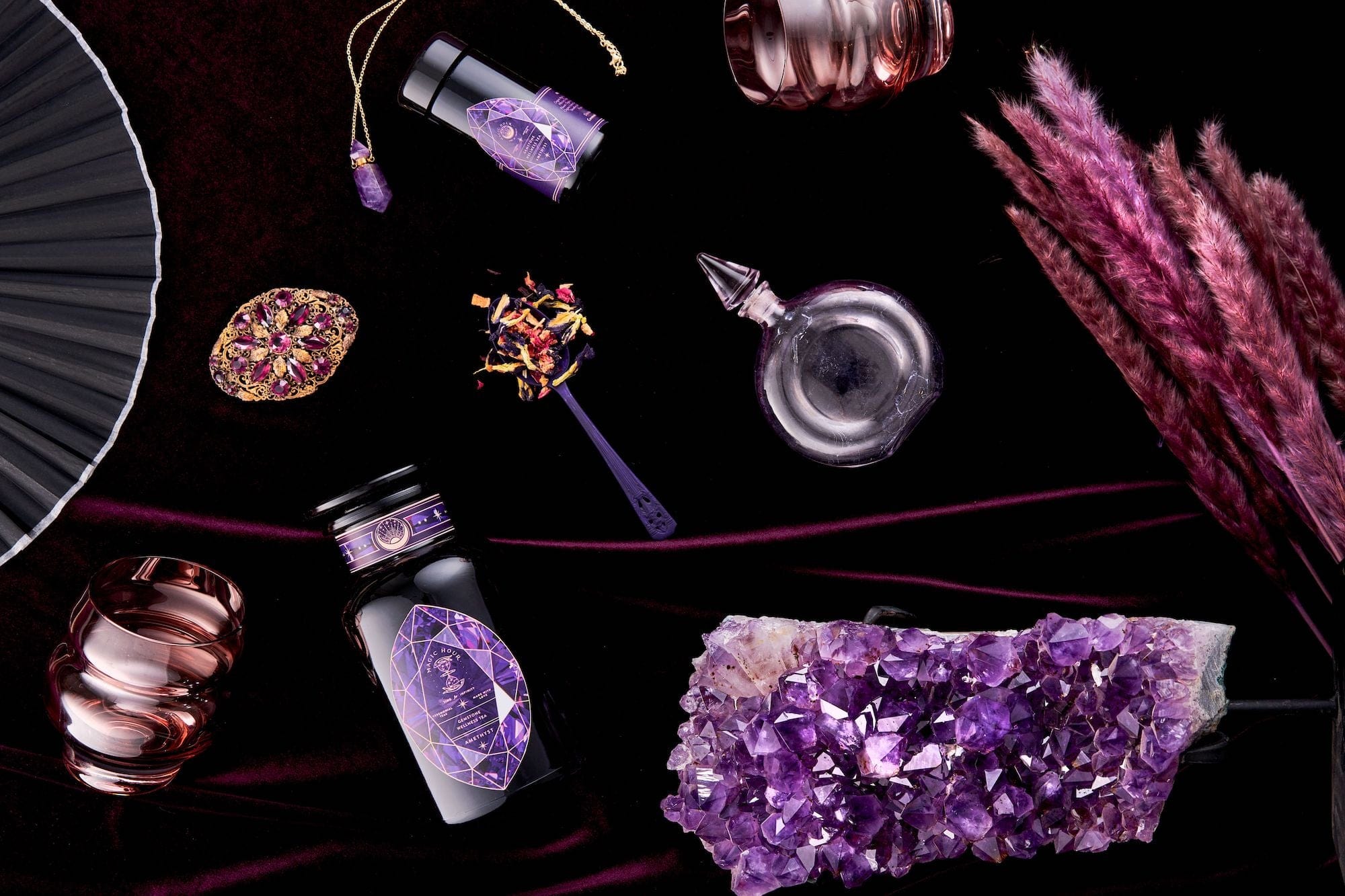 Product Image of Amethyst Tea with gem stones. 